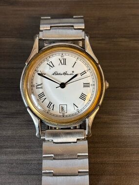 Vintage Eddie Bauer Two-Tone White Dial with Roman Numerals on steel bracelet